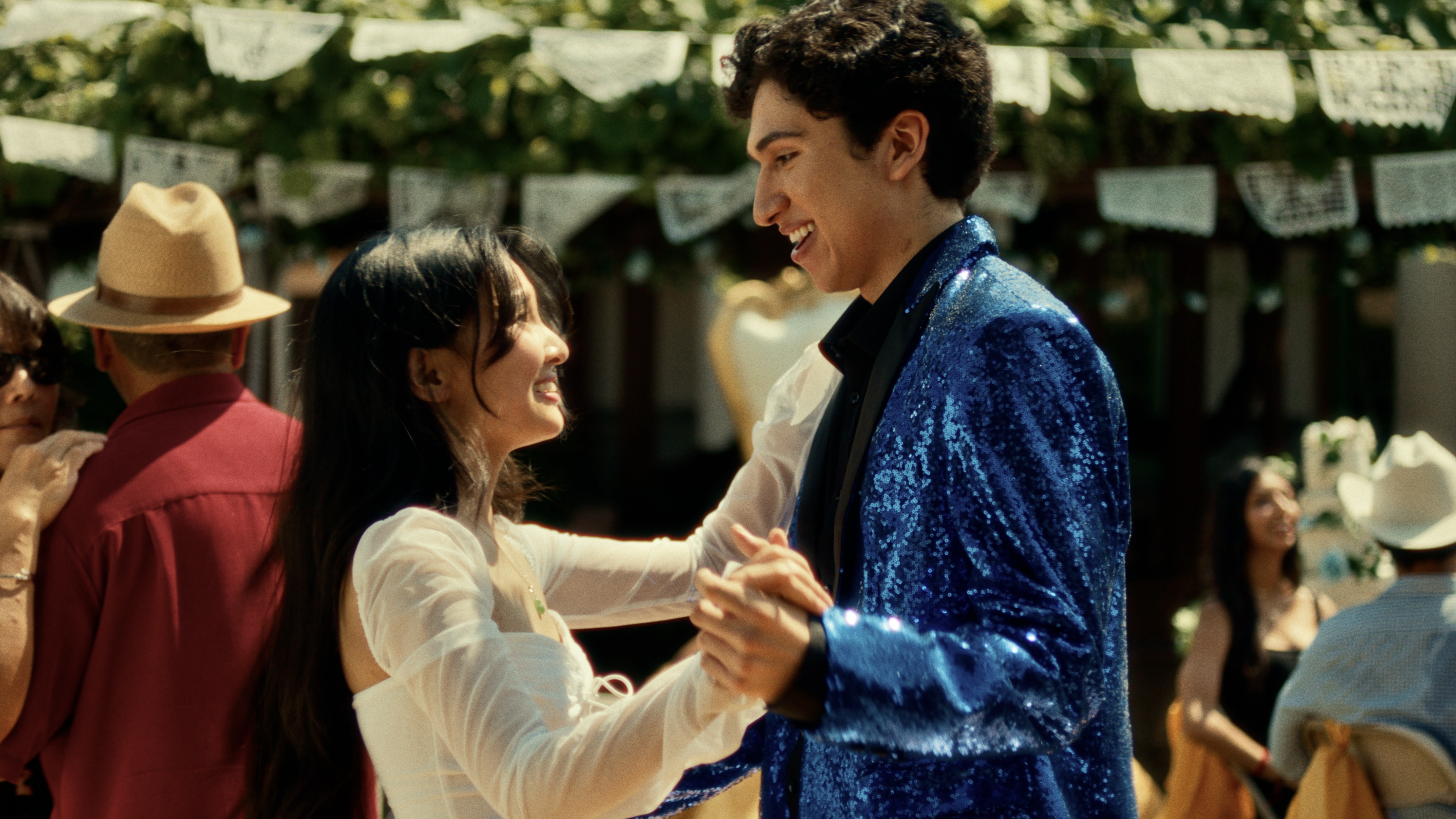 Caline Fang as Emily and Anthony González as Javier